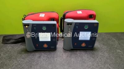 2 x Philips FR2+ Plus Defibrillators (Both Power Up) in Case with 2 x Batteries