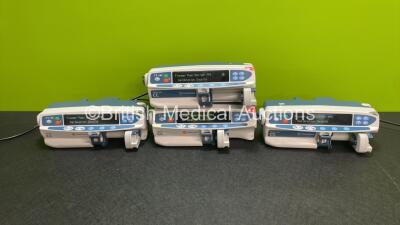 4 x CareFusion Alaris CC (2 x Plus) Syringe Pumps (All Power Up with Alarms - See Photos) *800336996 / 800337012 / 800337029 / 800336999*