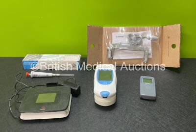 Mixed Lot Including 1 x Roche CoaguChek Pro II Unit with Docking Station, 1 x Niox Vero Monitor with Power Supply, 1 x IntelliSTIM Nerve Stimulator, 1 x Brand Piston-Operated Pipette and 1 x B.Braun Pole Clamp *Like New*