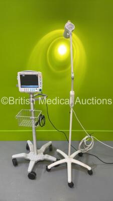 1 x Luxo Patient Examination Lamp on Stand - Missing 1 x Wheel (Powers Up with Good Bulb) and 1 x Datex-Ohmeda F-FM-00 Patient Monitor on Stand with N-FC-00 Gas Module with Mini D-Fend Water Trap (Powers Up) *S/N 6364301*