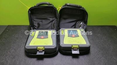 2 x Zoll AED PRO Defibrillators (Both Power Up with Stock Battery Stock Battery Not Included, 1 x with Light Scratches On Screen) In Carry Case