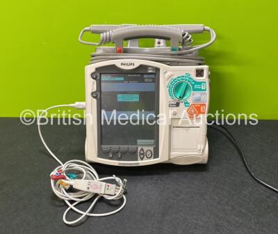 Philips Heartstart MRx Defibrillator (Powers Up) Including Pacer ,ECG and Printer Options with External Paddle Dock, External Hard Paddles, 1 x 3 Lead ECG Lead, 1 x Philips M3538A Battery and 1 x Philips M3539A Module