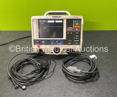 Physio Control Medtronic Lifepak 20e Defibrillator / Monitor (Powers Up with Missing Door) Including Pacer, ECG and Printer Options with 1 x Paddle Lead and 1 x 3 Lead ECG Lead *SN 42153329*