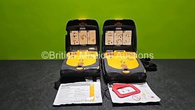 2 x Medtronic Lifepak CR Plus Defibrillators with 2 x Batteries and 2 x Physio Control Quik-Pak Pacing/Defibrillation/ECG Electrodes *Both Expired* in Carry Case (Both Power Up)