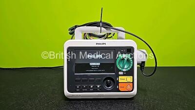 Philips Efficia DFM100 Defibrillator *Mfd 2019* Including Pacer, ECG and Printer Options Release Rev 2.0 with 1 x 3 Leads ECG Lead and 1 x Paddle Lead (Powers Up and Missing Battery - See Photo)