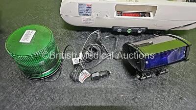 Mixed Lot Including 1 x Verathon BladderScan BVI9000 Series Calibration Tank, 1 x Seca Weighing Scale, 1 x Welch Allyn Stethoscope, 1 x ConMed Footswitch, 2x Braun ThermoScan Thermometers, 1 x Green Emergency 12v Light and 1 x Blue Emergency 12v Light - 5