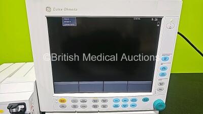 GE Datex Ohmeda F-CM1-04 Anaesthesia Monitor (Powers Up) with 1 x E-PRESTN-00 Module with ECG, SpO2, NIBP, T1, T2, P1 and P2 Options and 1 x GE Type E-CAi0-00 with D-Fend Water Trap *SN 6271001 / 6876437 / 6702903* - 4