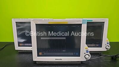 3 x Philips IntelliVue MP70 Patient Monitors (All Power Up and 1 x Missing Badge - See Photo) *SN DE 54937291 / DE843A3103 / DE84381777*