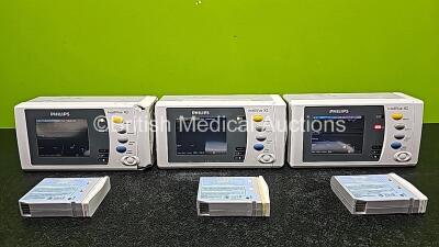 3 x Philips IntelliVue X2 Handheld Patient Monitors Including ECG, SpO2, NBP, Press and Temp Options *Mfd 1 x 2014 & 2 x 2015* (All Power Up with Stock Battery - Stock Battery Not Included and 2 x Damaged Cases - See Photos) with 3 x Philips M4607A Batter