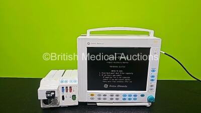 GE Datex Ohmeda F-CM1-04 Anaesthesia Monitor (Powers Up and Damaged Base - See Photo) with 1 x E-PRESTN-00 Module with ECG, SpO2, NIBP, T1, T2, P1 and P2 Options and 1 x GE Type E-CAi0-00 with D-Fend Water Trap *SN 6277821 / 6270683 / 6280347*