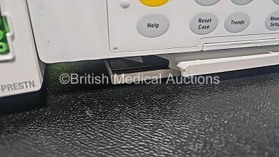 GE Datex Ohmeda F-CM1-04 Anaesthesia Monitor (Powers Up and Damaged Base - See Photo) with 1 x E-PRESTN-00 Module with ECG, SpO2, NIBP, T1, T2, P1 and P2 Options and 1 x GE Type E-CAi0-00 with D-Fend Water Trap *SN 6277821 / 6270683 / 6280347* - 3