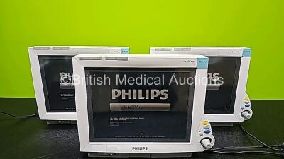3 x Philips IntelliVue MP70 Patient Monitors (All Power Up, 1 x Cracked Case, and 1 x Damaged Module Connector - See Photo) and 2 x Philips Module Racks *SN DE61754167 / DE73165546 / DE73165545*