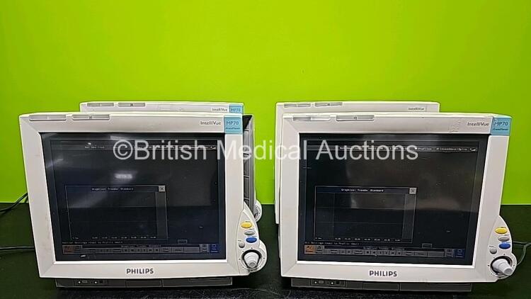 4 x Philips IntelliVue MP70 Patient Monitors (All Power Up, 1 x Missing Badge, 1 x Missing Case and All Cracked/Damaged Cases - See Photos) *SN DE84381536 / DE84381527 / DE61743062 / DE52034763*