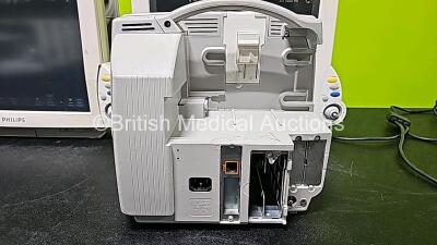 Job Lot Including 2 x Philips IntelliVue MP70 Patient Monitors (Both Power Up, Both Damaged Cases and 1 x Missing Dial - See Photos), 1 x Philips IntelliVue MP30 Touch Screen Patient Monitor (Powers Up, Missing Battery Door and Damaged Case - See Photos) - 9