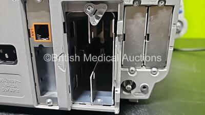 Job Lot Including 2 x Philips IntelliVue MP70 Patient Monitors (Both Power Up, Both Damaged Cases and 1 x Missing Dial - See Photos), 1 x Philips IntelliVue MP30 Touch Screen Patient Monitor (Powers Up, Missing Battery Door and Damaged Case - See Photos) - 10