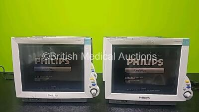 4 x Philips IntelliVue MP70 Patient Monitors (All Power Up and All Damaged/Cracked Cases - See Photos) *SN DE73164963 / DE73164980 / DE52033898 / DE61751577*