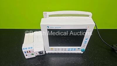 GE Datex Ohmeda F-CM1-04 Anaesthesia Monitor (Powers Up) with 1 x E-PRESTN-00 Module with ECG, SpO2, NIBP, T1, T2, P1 and P2 Options and 1 x GE Type E-CAi0-00 with D-Fend Water Trap *SN 6270682 / 6875770 / 6003195* - 2