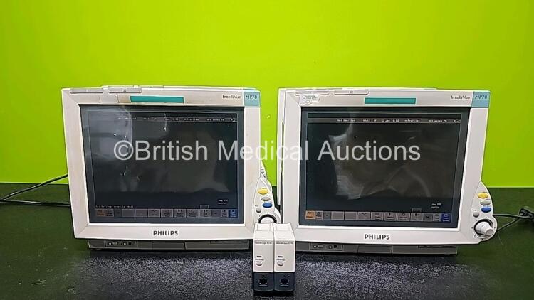 4 x Philips IntelliVue MP70 Patient Monitors with 2 x Philips IntelliBridge EC10 Modules (All Power Up, 1 x Cracked Case and 1 x Missing Dial - See Photo) *SN DE84381763 / DE73165265 / DE84381769 / DE35015194*