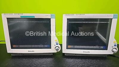 4 x Philips IntelliVue MP70 Patient Monitors with 2 x Philips IntelliBridge EC10 Modules (All Power Up, 1 x Cracked Case and 1 x Missing Dial - See Photo) *SN DE84381763 / DE73165265 / DE84381769 / DE35015194* - 7