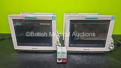 4 x Philips IntelliVue MP70 Patient Monitors with 2 x Philips Press Modules (All Power Up and 1 x Missing Cover from Module - See Photo) *SN DE84381767 / DE84381773 / DE84381768 / DE84381766*