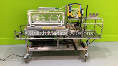 Atom V-808 Transcapsule Infant Transport Incubator on Stretcher with LSU Suction Pump (Powers Up)