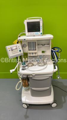 Datex-Ohmeda S/5 Aespire Anaesthesia Machine with Datex-Ohmeda 7100 Ventilator Software Version 1.4, Datex-Ohmeda Anesthesia Monitor with E-CAiO Gas Module and E-PRESTN Module, Bellows, Absorber and Hoses (Powers Up) *S/N AMXL00777*