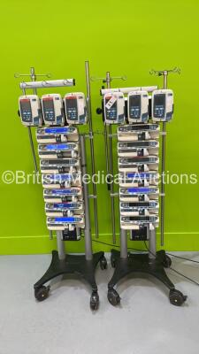 2 x Alaris Gateway Docking Stations with 6 x Carefusion Alaris GP Infusion Pumps and 14 x Alaris GH Syringe Pumps (Majority Power Up - Some with Errors)