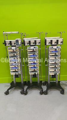 3 x Alaris Gateway Docking Stations with 21 x Carefusion Alaris GH Syringe Pump (Majority Power Up - Some with Errors)