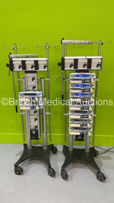 2 x Alaris Gateway Docking Stations (1 x No Power) with 9 x Alaris GH Syringe Pumps (Majority Power Up - Some with Errors)