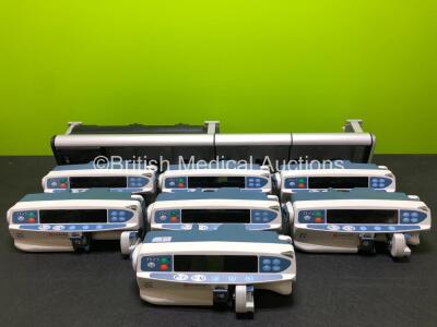 7 x CareFusion Alaris CC Syringe Pumps with 1 x Alaris Gateway Workstation *SN 800354250 / 800356537 / NA / 800338266 / 800338858 / 800356507 / 800356468*