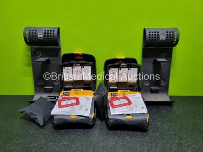 2 x Medtronic Lifepak CR Plus Defibrillators *Mfd - 2016 / 2016* (Both Power Up) in Case with 2 x Batteries, 2 x Brackets and 2 x Ambu Res-Cue First Responder Kits