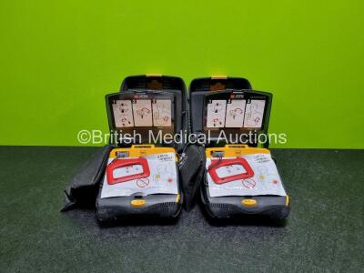 2 x Medtronic Lifepak CR Plus Defibrillators *Mfd - 2016 / 2016* (Both Power Up) in Case with 2 x Batteries and 2 x Ambu Res-Cue First Responder Kits