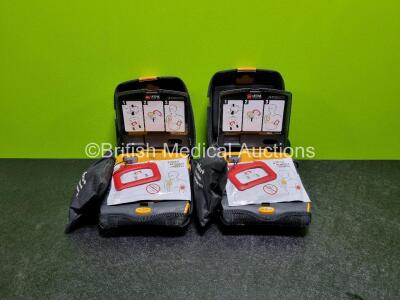 2 x Medtronic Lifepak CR Plus Defibrillators *Mfd - 2016 / 2016* (Both Power Up) in Case with 2 x Batteries and 2 x Ambu Res-Cue First Responder Kits