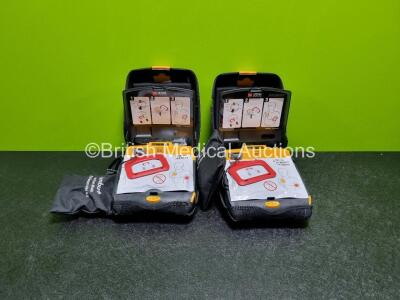 2 x Medtronic Lifepak CR Plus Defibrillators *Mfd - 2016 / 2016* (Both Power Up) in Case with 2 x Batteries and 2 x Ambu Res-Cue First Responder Kits