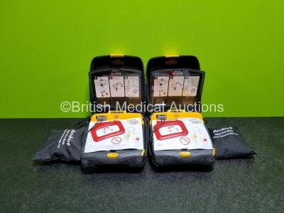 2 x Medtronic Lifepak CR Plus Defibrillators *Mfd - 2016 / 2016* (Both Power Up) in Case with 2 x Batteries and 2 x Ambu Res-Cue First Responder Kits