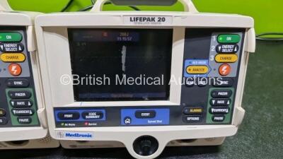 2 x Physio Control Medtronic Lifepak 20 Defibrillators / Monitors *Mfd 2004 / 2004 (Both Power Up, Both Missing Door) Including Pacer, ECG and Printer Options *ri* - 2