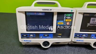 3 x Lifepak 20 Defibrillators / Monitors (All Power Up, All Missing Doors) - 4