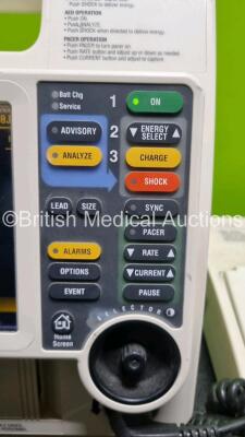 Job Lot Including 1 x Medtronic Lifepak 12 Biphasic Defibrillator (Powers Up) Including Pacer, ECG and Printer Options with 2 x Batteries Apex / Sternum External Hard Paddles, 3 Lead ECG Lead, AC Power Adaptor and Medtronic Battery Support System 2 Charg - 3