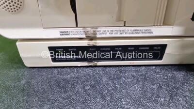 Job Lot Including 1 x Medtronic Lifepak 12 Biphasic Defibrillator (Powers Up) Including Pacer, ECG and Printer Options with 2 x Batteries Apex / Sternum External Hard Paddles, 3 Lead ECG Lead, AC Power Adaptor and Medtronic Battery Support System 2 Charg - 5