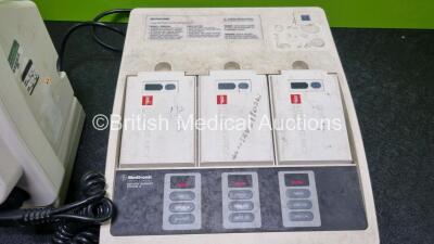 Job Lot Including 1 x Medtronic Lifepak 12 Biphasic Defibrillator (Powers Up) Including Pacer, ECG and Printer Options with 2 x Batteries Apex / Sternum External Hard Paddles, 3 Lead ECG Lead, AC Power Adaptor and Medtronic Battery Support System 2 Charg - 6