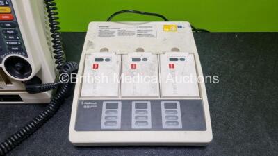 Job Lot Including 1 x Medtronic Lifepak 12 Biphasic Defibrillator (Powers Up) Including Pacer, ECG, SpO2, NIBP and Printer Options with 2 x Batteries, Apex / Sternum External Hard Paddles, 3 Lead ECG Lead, AC Power Adaptor and Medtronic Battery Support S - 6