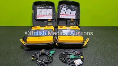 2 x Medtronic Lifepak 1000 Defibrillators *Mfd - 2015 / 2013* (Both Power Up) in Carry Case with 2 x Batteries *Install Before - 2024 / 2028* and 2 x 3 Lead ECG Leads *SN 43820023 / 43820835*