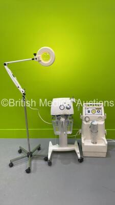 1 x Medela dominant 50 Suction Pump on Stand, 1 x Brandon Medical Patient Examination Lamp on Stand and 1 x Oxylitre Suction Unit on Stand (All Power Up)
