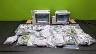 2 x EDAN iM50 Touch Screen Patient Monitors (Like New In Box) Including ECG, SpO2, NIBP, IBP1, IBP2, T1, T2 and CO2 Module Holder Options *Mfd 2020* with 2 x Batteries, 2 x BP Hoses, 2 x BP Cuff, 2 x IBP Pressure Transducers, 2 x SpO2 Sensors, 2 x AC Powe