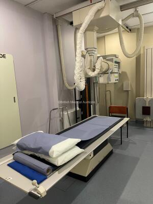 Siemens Tosrad Analogue X-ray System with 2015 Tube Including Patient Table, Overhead Tube Bucky (2015 Siemens Tube), Chest / Wall Stand Bucky, Ceiling Rails and Operator Console. Functional and complete system when removed, OEM maintained, system has bee