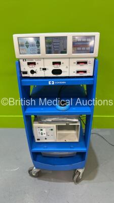 Covidien ForceTriad Electrosurgical / Diathermy Unit Software Version 4.00 with Dome Footswitch and RapidVac Smoke Evacuator on Stand (Powers Up) *S/N T2A26900EX* **Mfd 01/2012**