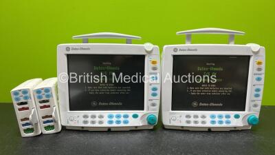 2 x GE Datex Ohmeda S/5 FM Patient Monitors (Both Power Up and 1 x Damaged Casing- See Photos) with 2 x GE E-PSMP-00 Modules Including ECG, SpO2, NIBP, P1-P2 and T1-T2 Options *SN 6436396 / 6435273 / NA / NA*