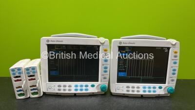 2 x GE Datex Ohmeda S/5 FM Patient Monitors (Both Power Up and Both Damaged Casings- See Photos) with 2 x GE E-PSMP-00 Modules Including ECG, SpO2, NIBP, P1-P2 and T1-T2 Options *SN 6678146 / 6391904 / 6715367 / 6325078*