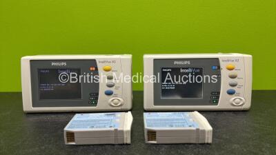 2 x Philips IntelliVue X2 Handheld Patient Monitors Including ECG, SpO2, NBP, Press and Temp Options *Both Mfd 2012* (Both Power Up with Stock Batteries - Stock Batteries Not Included and 1 x Cracked Case - See Photo) with 2 x Philips M4607A Batteries (Bo