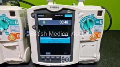 3 x Philips Heartstart MRx Defibrillators (All Power Up) Including Pacer ,ECG and Printer Options with 1 x Philips M3725A Test Load, 3 x Philips M3539A Modules and 3 x - 4